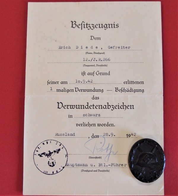 WW2 GERMAN ARMY WOUND BADGE IN BLACK & AWARD DOCUMENT RUSSIA 1942