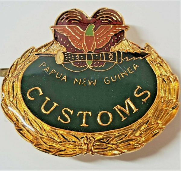 OBSOLETE PAPUA NEW GUINEA CUSTOMS UNIFORM CAP BADGE