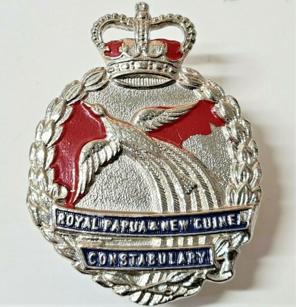 POST WW2 ERA OBSOLETE PAPUA NEW GUINEA POLICE FORCE UNIFORM CAP BADGE