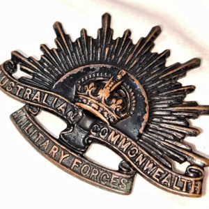 AUSTRALIAN ANZAC WW1 & WW2 RISING SUN UNIFORM HAT OR CAP BADGE MEDAL