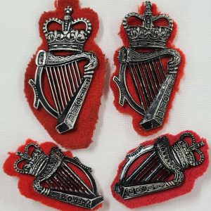 POST WW2 ERA OBSOLETE IRISH HELMET HAT UNIFORM BADGES