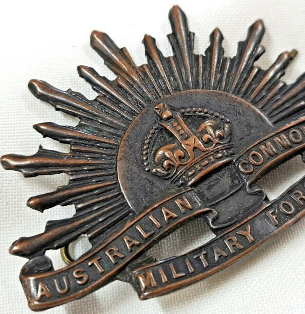 AUSTRALIAN ANZAC WW1 RISING SUN UNIFORM HAT OR CAP BADGE ENGLISH MADE