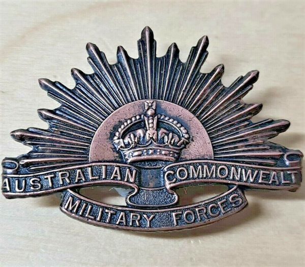 OVAL LUGS AUSTRALIAN ANZAC WW1 & WW2 RISING SUN UNIFORM COLLAR BADGE