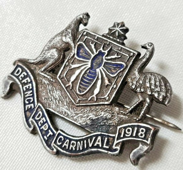 WW1 AUSTRALIAN ARMY DEFENCE DEPARTMENT CARNIVAL BADGE 1918 BY STOKES & SONS