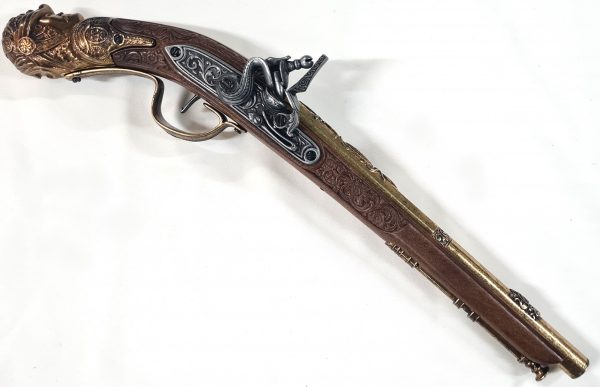 DENIX 1700s GERMAN FLINTLOCK PISTOL EUROPEAN GUN 1314 Reproduction of flintlock pistol made of metal and plastic imitation wooden stock, with simulated mechanism of loading and firing.. These pistols were used as self-defense weapons until the middle of the 19th century. Their effective range was short and often they were used as a complement to a sword or knife. Flintlock pistols were prone to many problems compared to modern weapons, due to moisture or accidental shots. In combat, usually these weapons were used for a single shot, since the method of reloading was very slow and it was not usually time enough to recharge. Therefore the fighters after firing were forced to draw their sabers or swords or to use the pistol as a blackjack, since the circumstances did not allow to recharge them in time. Relive with the historical reproduction of this DENIX pistol the best battles of the seventeenth century!