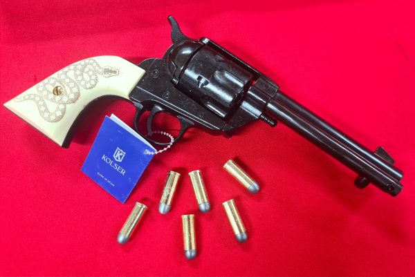 Western Peacemaker Single Action Army Revolver 45 pistol with 6 cap gun bullet rounds and gift box by Kolser black with faux ivory snake handle